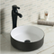 マット色のカウンター トップの浴室の流しの陶磁器の小さい円形のLavaboの洗浄芸術の洗面器
