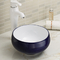 反対の洗面器のハンドメイドの陶磁器の流しの衛生洗面器の浴室の上の楕円形